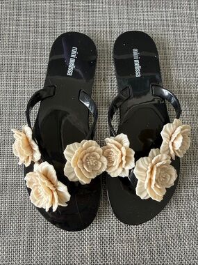 Mini Melissa Black Jelly Flip-Flops with Cream Floral Appliqués